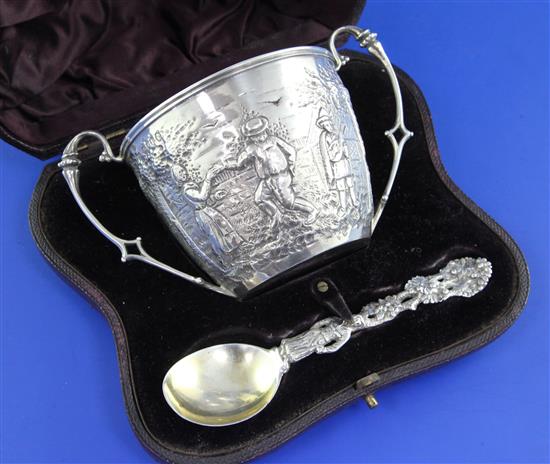 A cased Victorian repousse silver christening porringer and spoon,